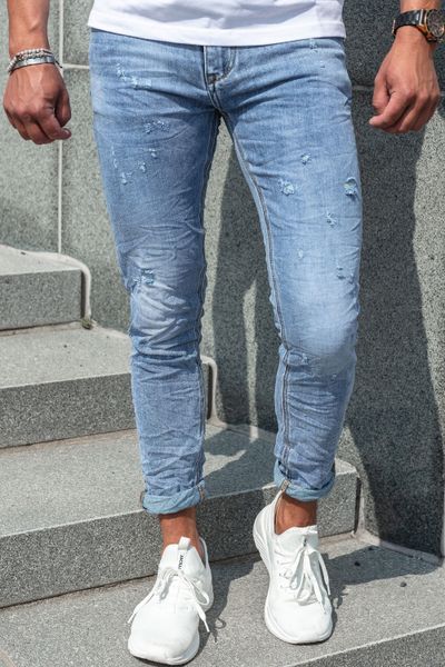 Jeans azzurri chiaro con lavaggio pietra e superficie rotta L32 JERONE Jeans azzurri chiaro con lavaggio pietra e superficie rotta L32 JERONE