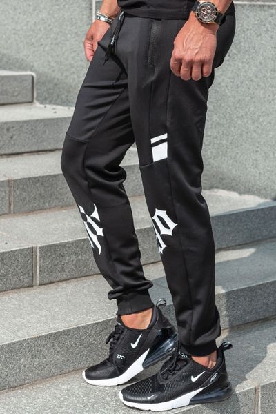 Pantaloni da college neri con superficie liscia e stampa