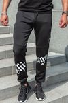 Pantaloni da college neri con superficie liscia e stampa