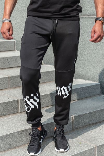 Pantaloni da college neri con superficie liscia e stampa
