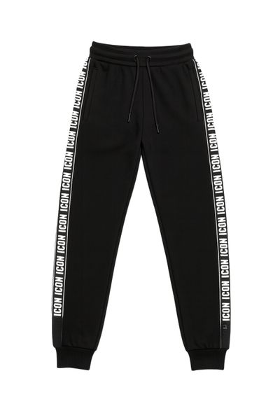 Pantaloni felpati neri con stampa testuale a strisce JERONE Pantaloni felpati neri con stampa testuale a strisce JERONE